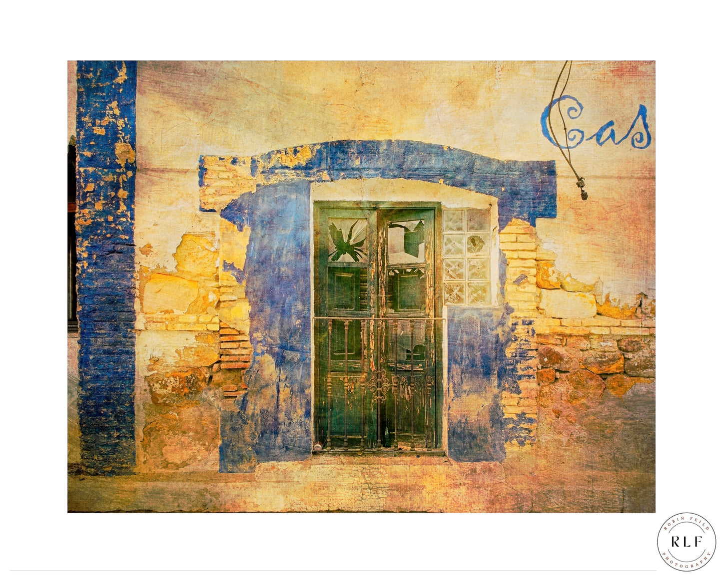 Faded wall with a broken restaurant window and blue and yellow peeling paint at a local Spanish train station. Fine art photography by RLF Photography