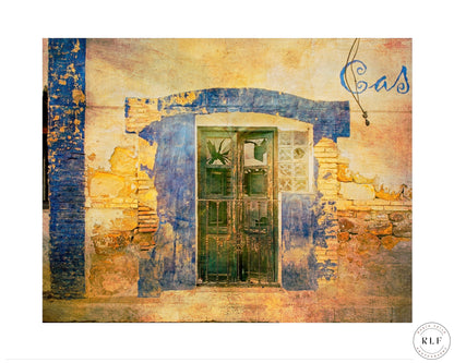 Faded wall with a broken restaurant window and blue and yellow peeling paint at a local Spanish train station. Fine art photography by RLF Photography