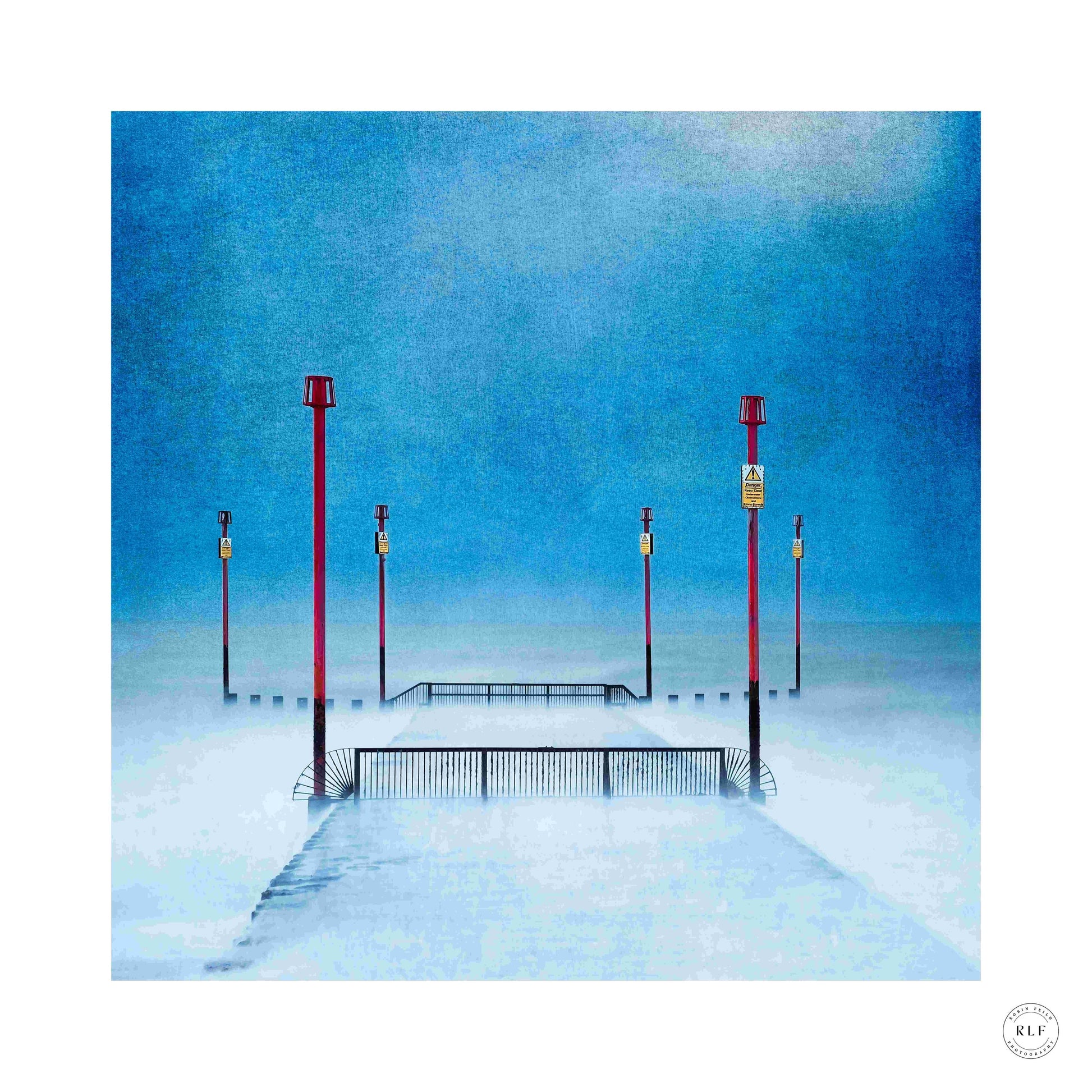 Red Sentinels - misty pier with red bollard lights