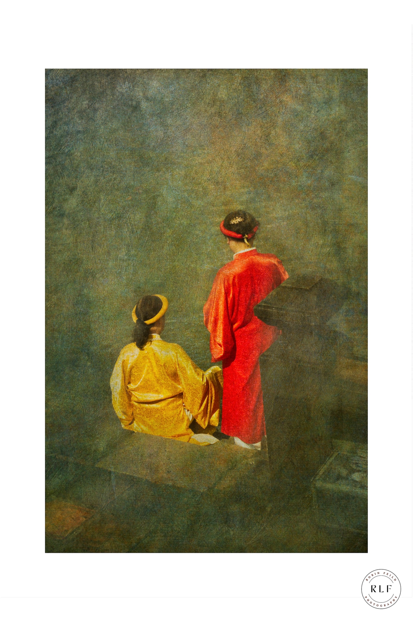 Two women in traditional Vietnamese red and gold robes sitting in contemplation against a textured background